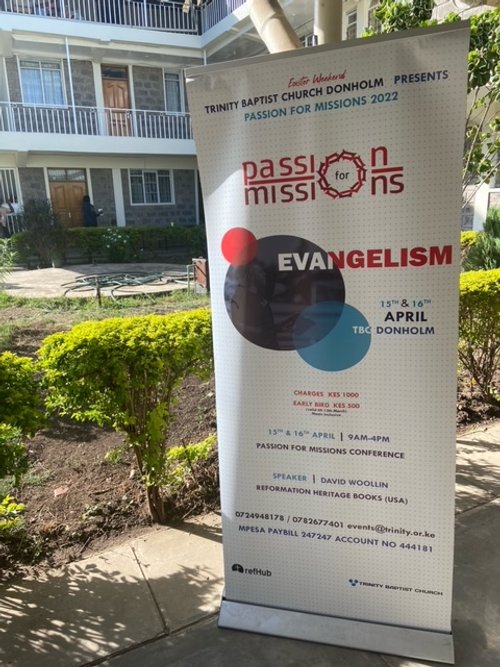 Sign advertising David Woollin from Reformation Heritage Books speaker at  Trinity Baptist Church Nairobi conference on Evangelism and Passion for Missions